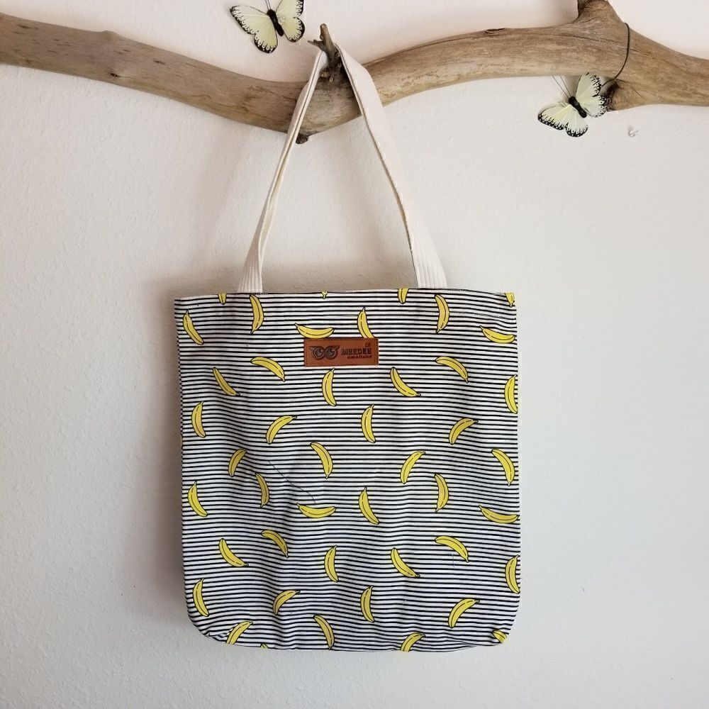 Black and white striped tote with bananas
